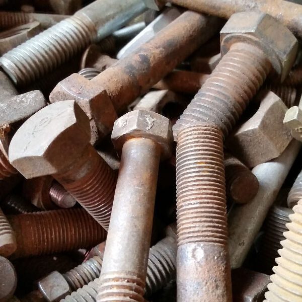 How do you clean rusty nuts and bolts